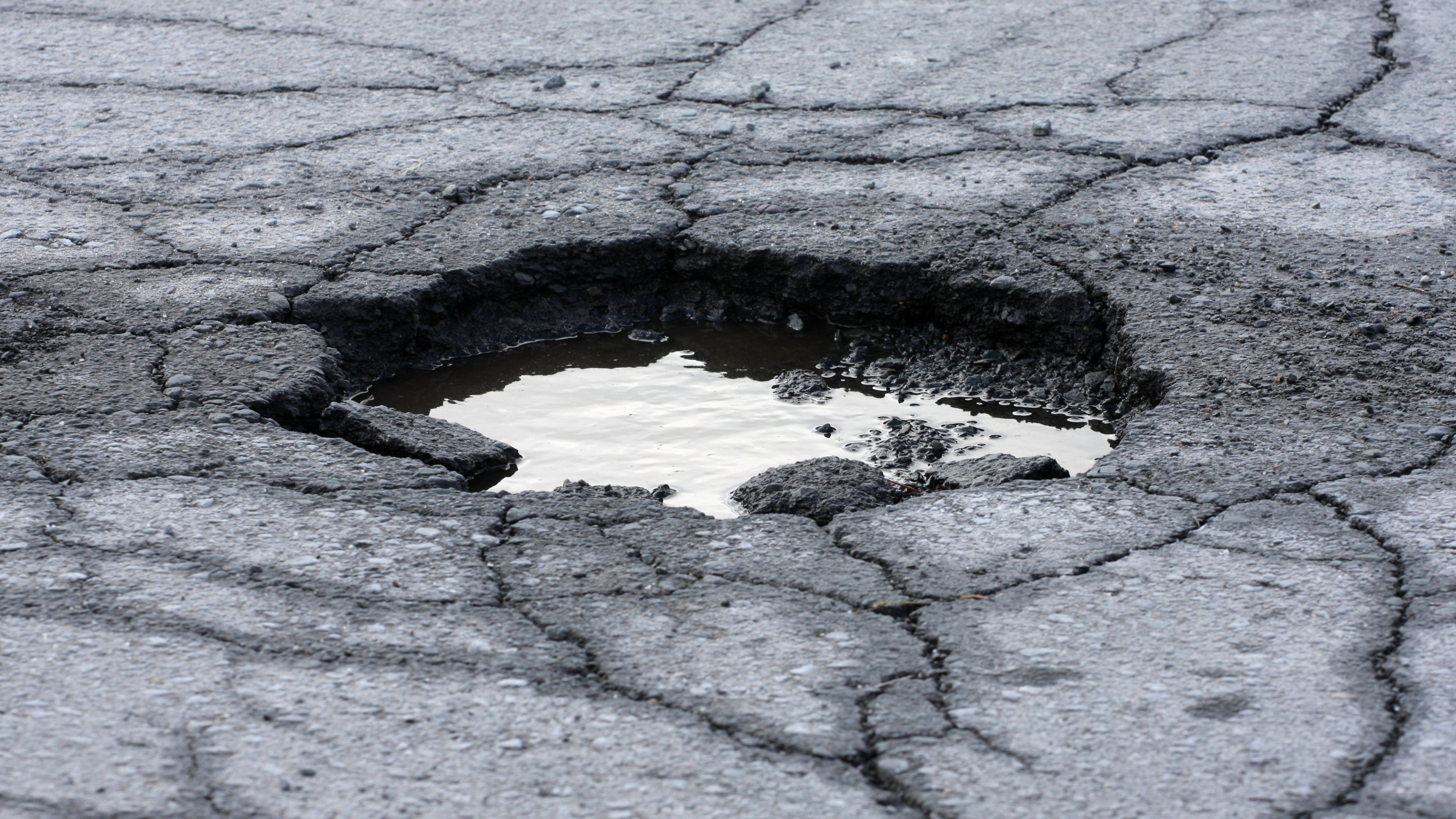 What Causes Potholes in Asphalt Driveways and How to Fix Them