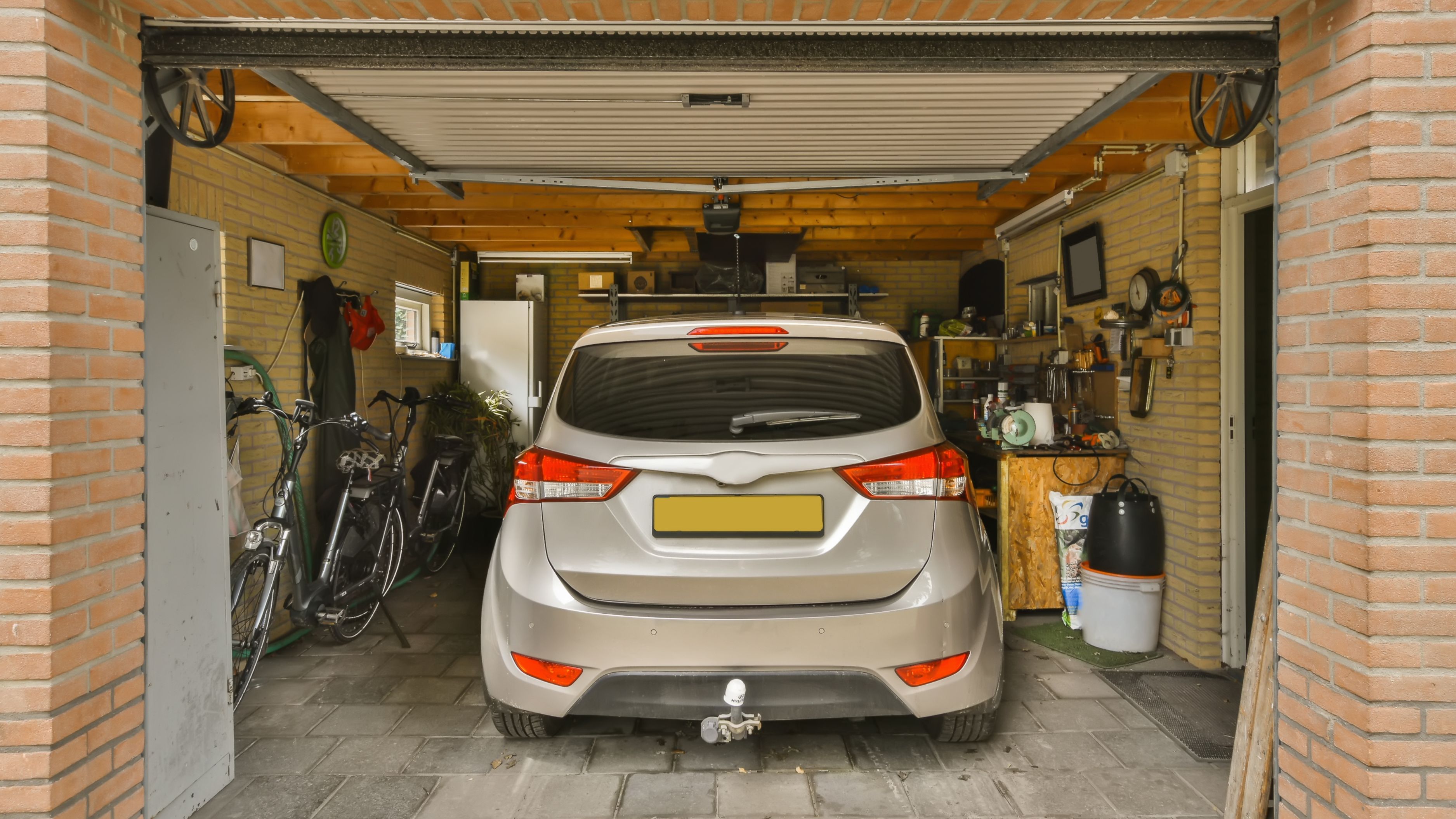 How to Use Vertical Space in a One-Car Garage Workshop